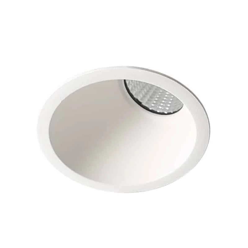Downlight fixo com aro inclinado para iluminar paredes